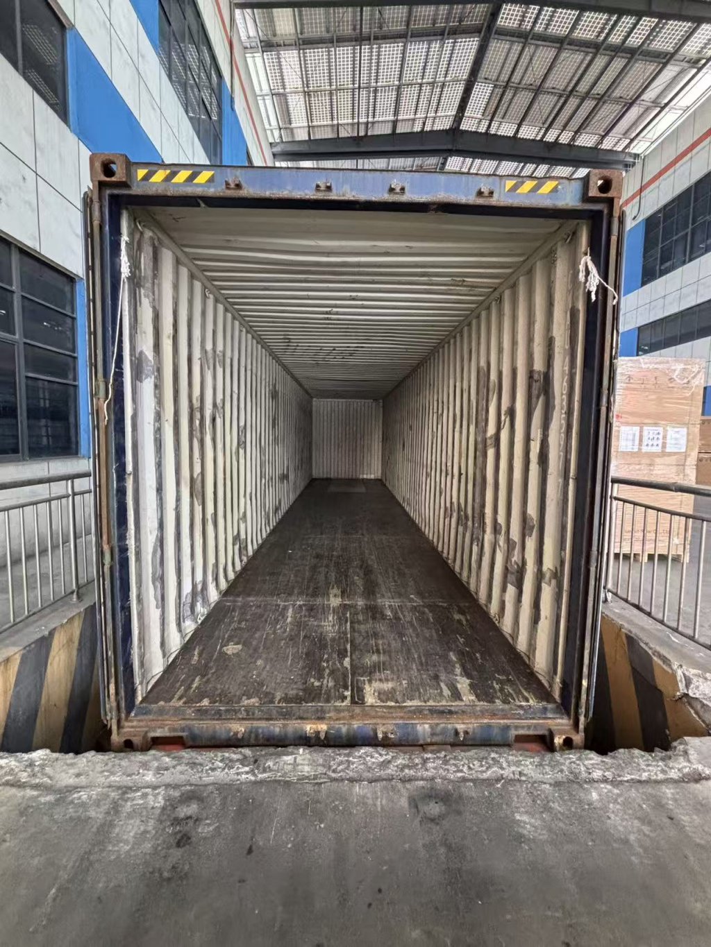 Empty 40ft container prepared for solar panel loading