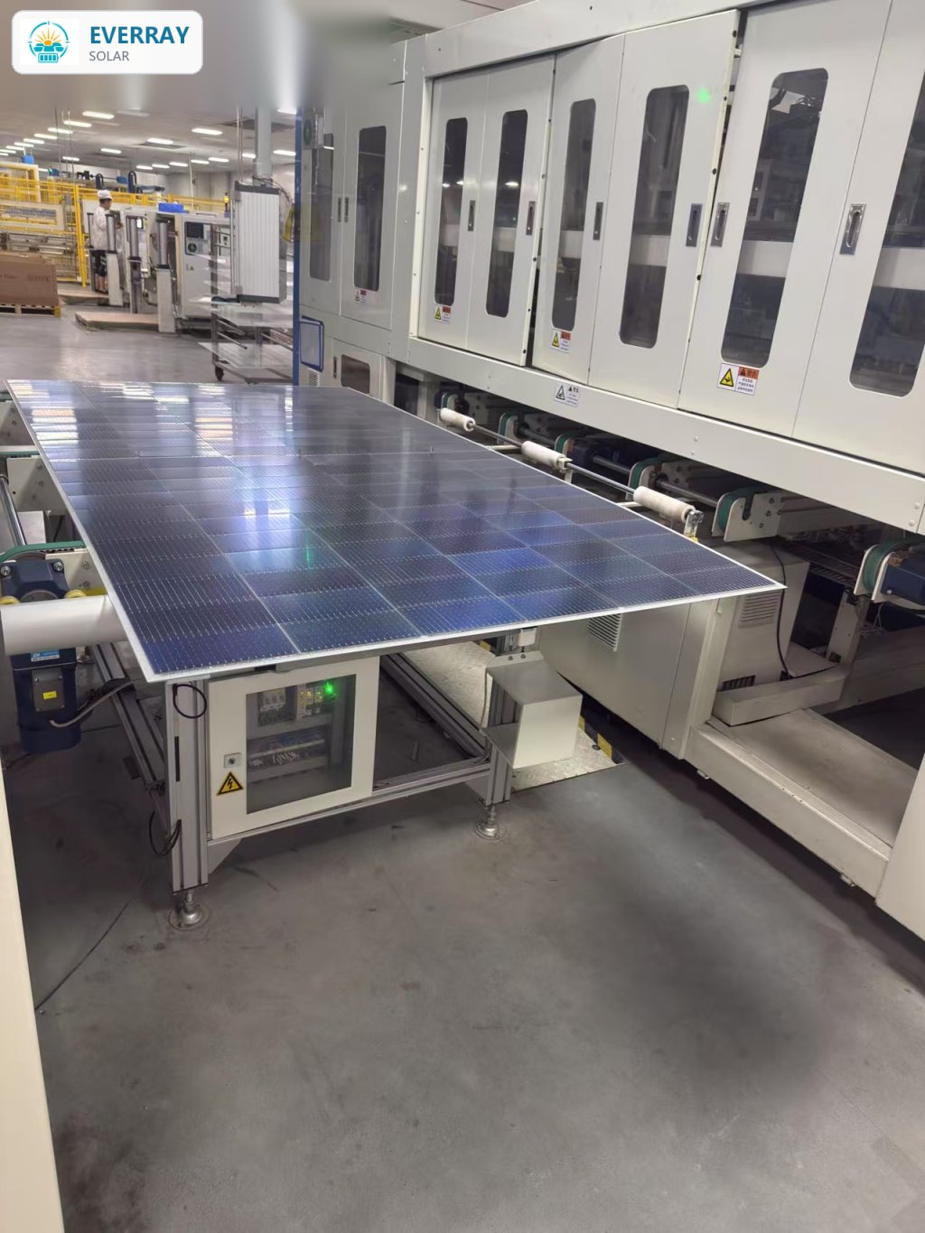 Solar cell layup station assembling cells onto glass substrate